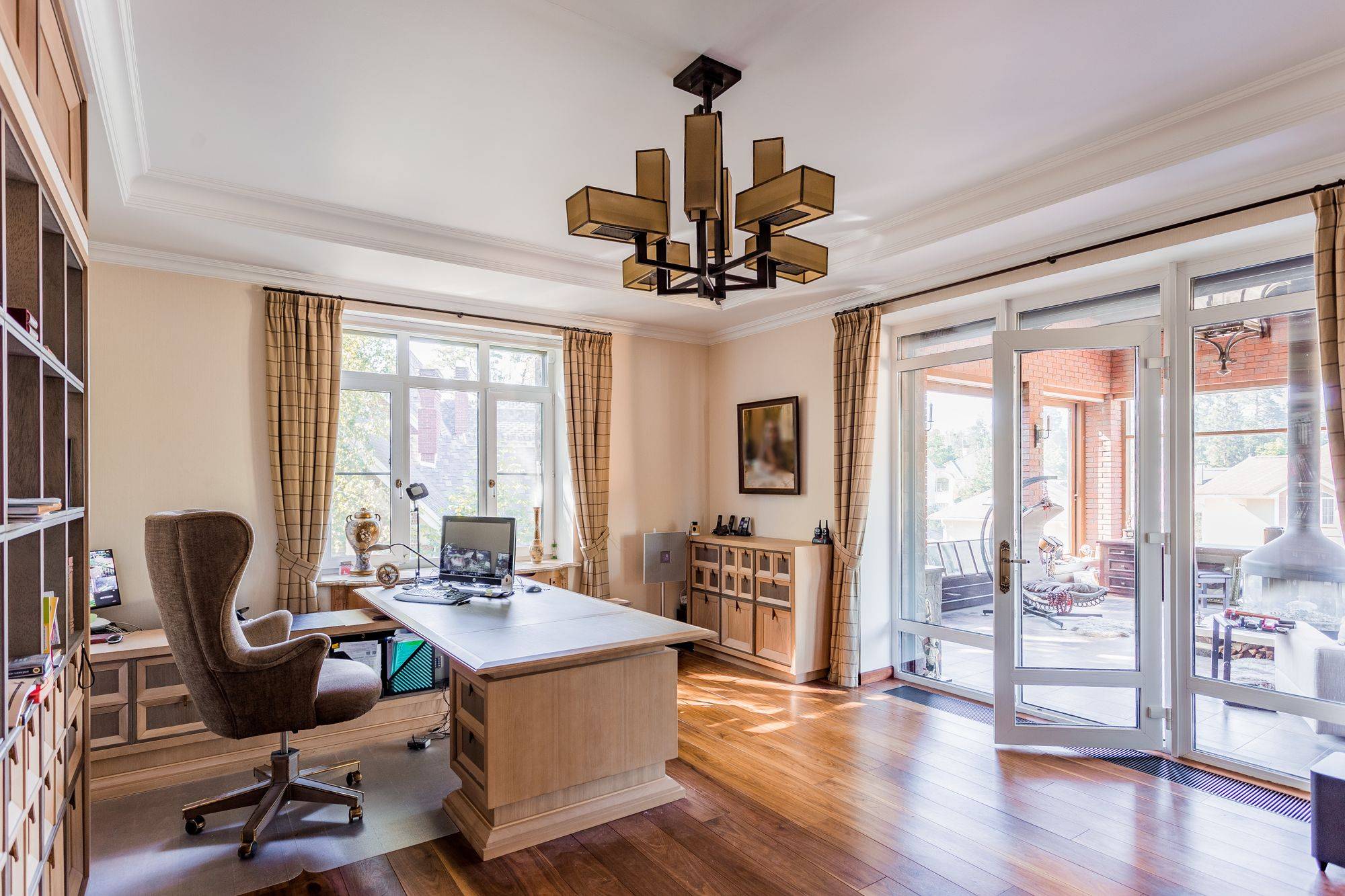 Bright office with French doors and tall windows