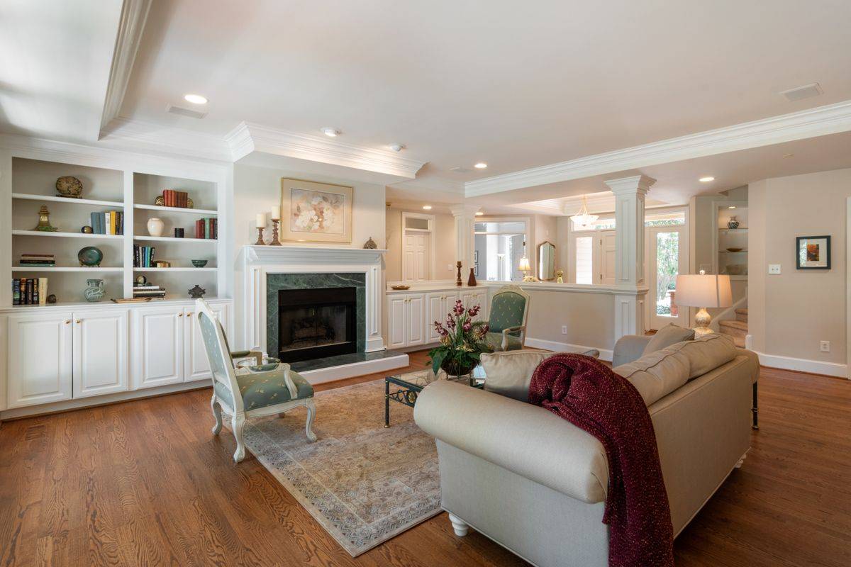 Classic living room with built-in shelves and fireplace